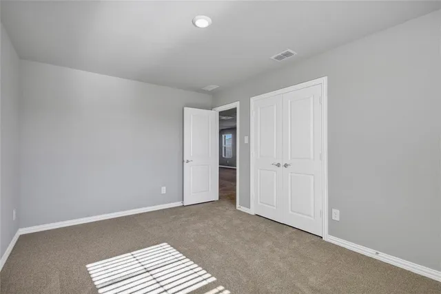 a view of room with walk in closet