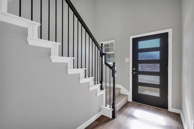 a view of an entryway with staircase