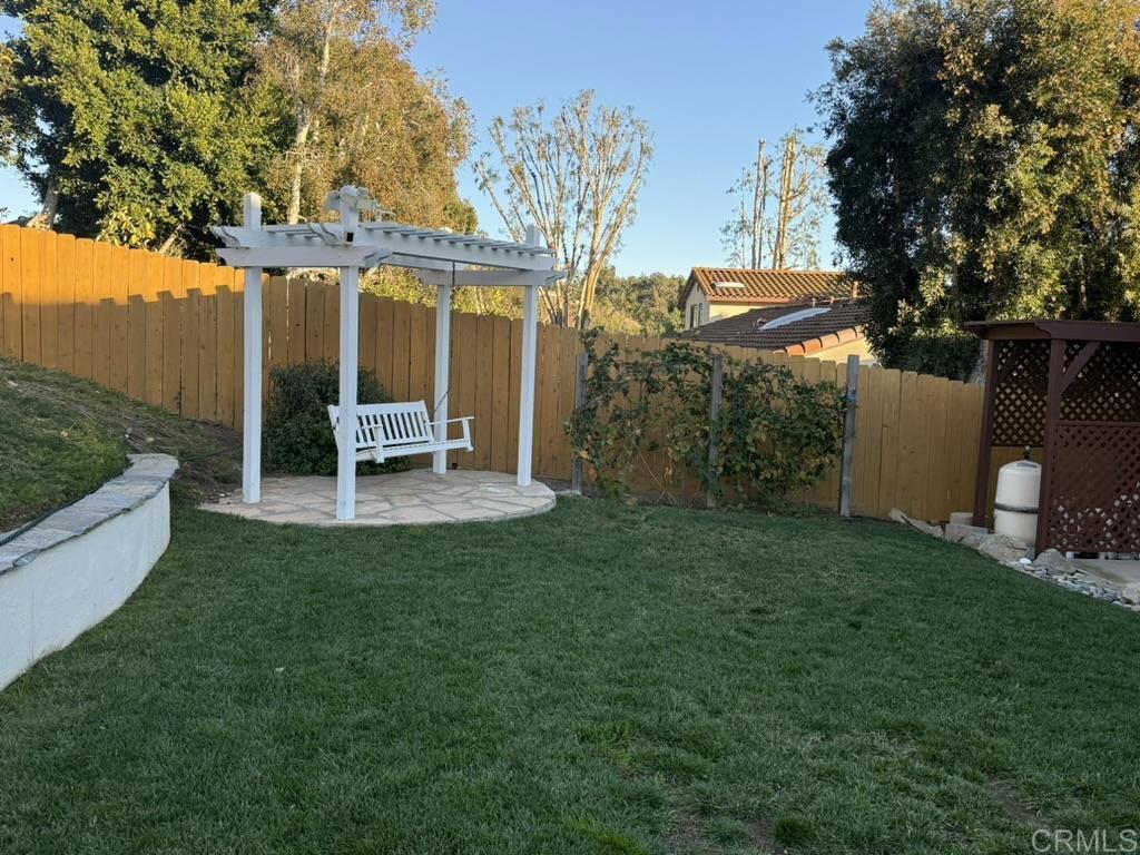 234 Winterhawk Lane Encinitas, CA 92024 - Photo 13 of 20 a view of a house with backyard porch and sitting area