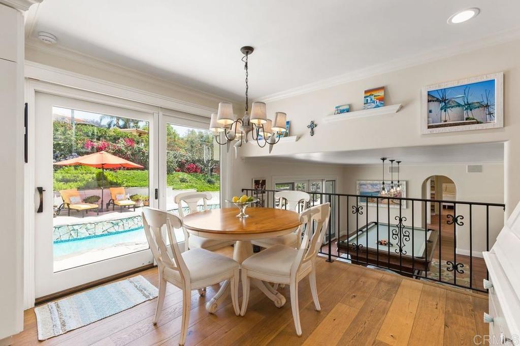 234 Winterhawk Lane Encinitas, CA 92024 - Photo 8 of 20 a view of a dining room with furniture window and outside view