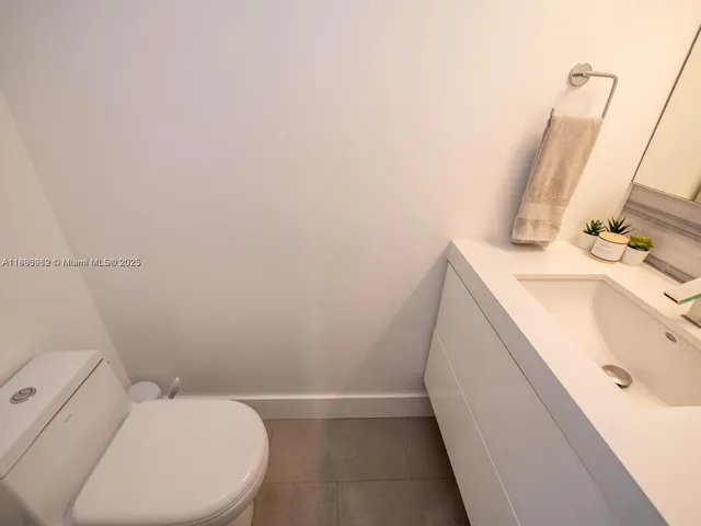a bathroom with a sink and a vanity