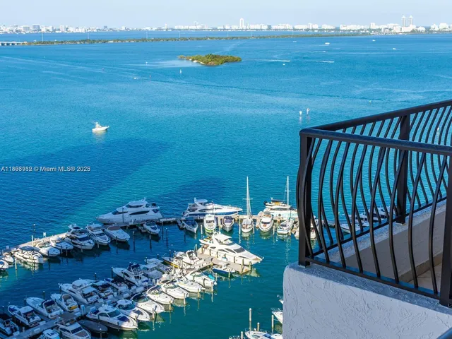 a view of a chairs and table in back