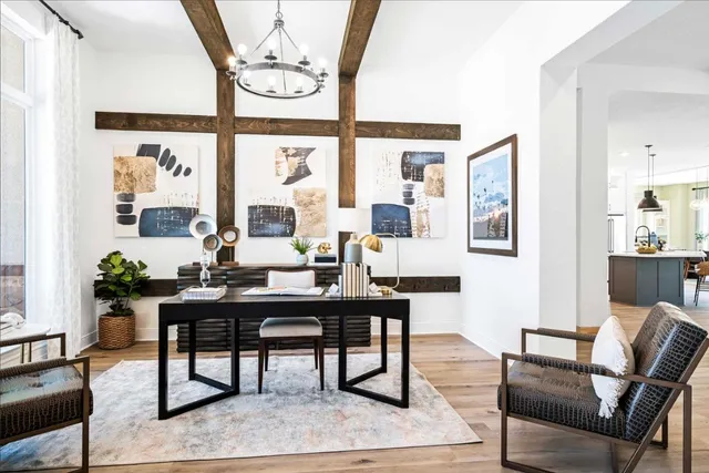 a view of a livingroom with furniture and window