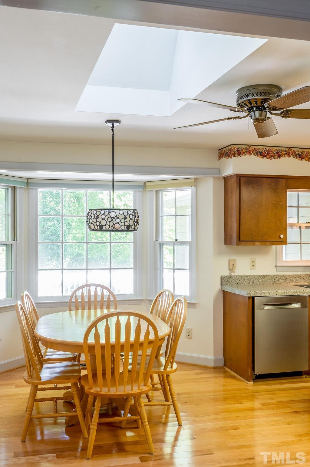 215 Lawrence Road Cary, NC 27511 - Photo 16 of 28 a dining room with furniture and window