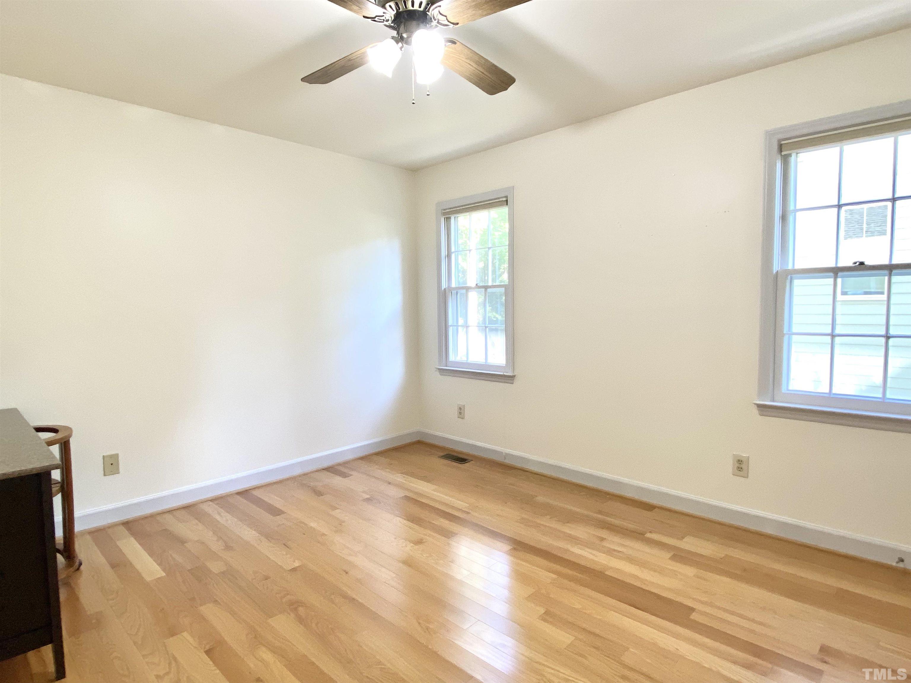 215 Lawrence Road Cary, NC 27511 - Photo 20 of 28 a view of an empty room with a window