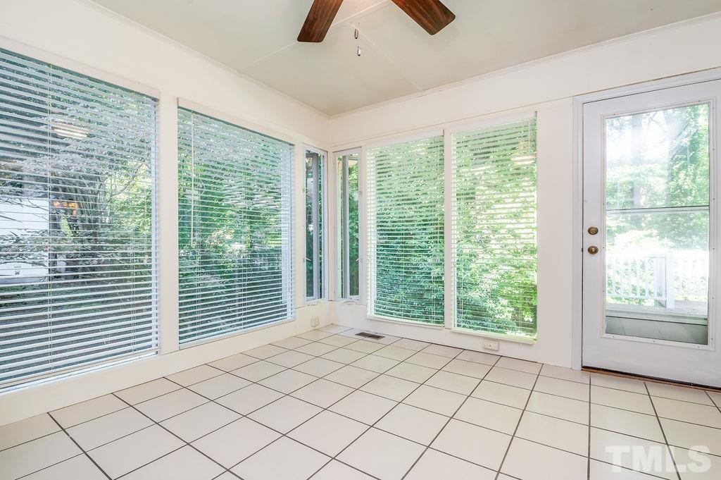 215 Lawrence Road Cary, NC 27511 - Photo 9 of 28 a view of an empty room with a window