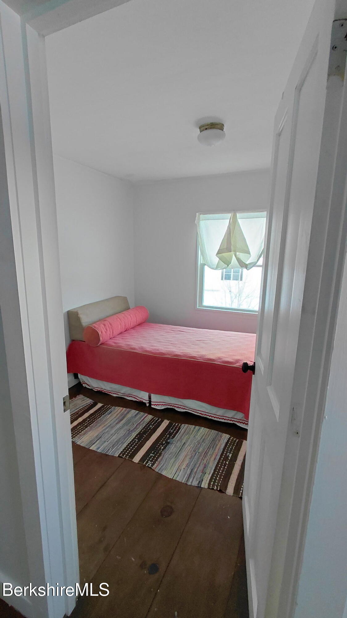 95 Water Farm Road Sheffield, MA 01257 - Photo 18 of 27 a view of a room with furniture and a window