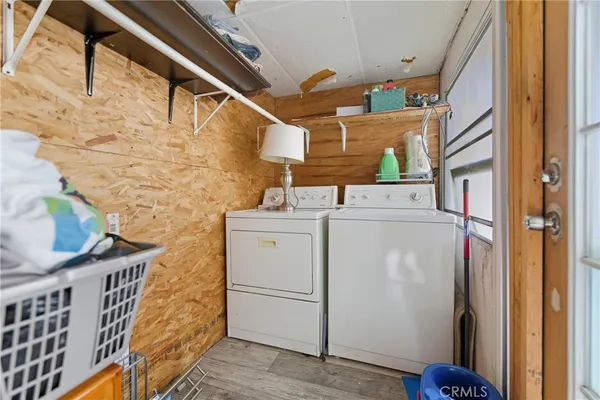 a bathroom with a sink vanity mirror and toilet