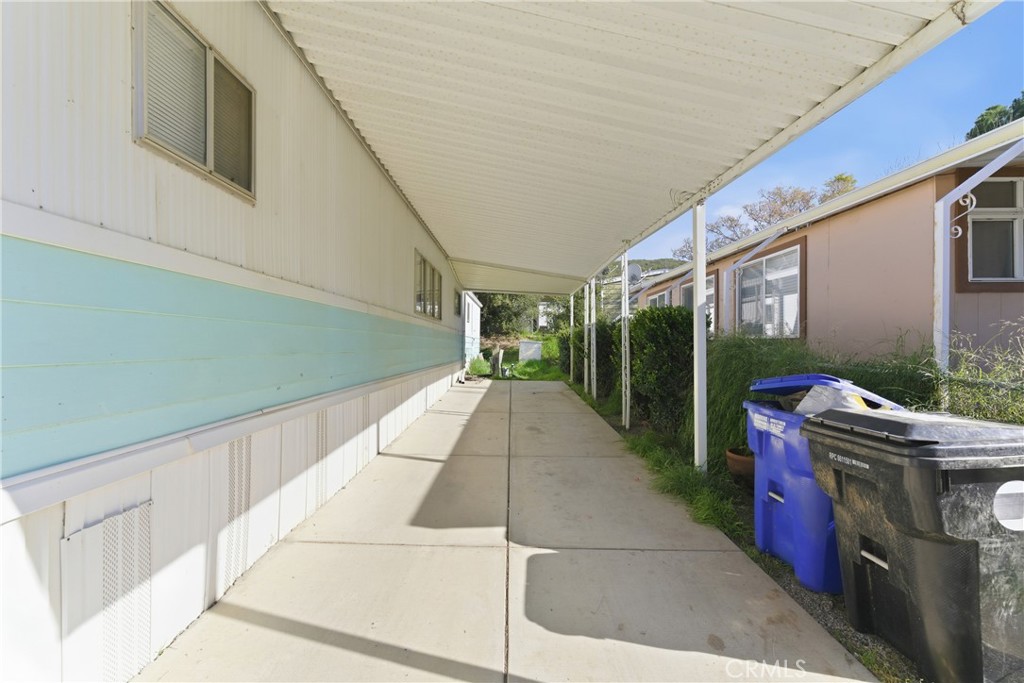 36200 Paradise Ranch Road Castaic, CA 91384 - Photo 30 of 31 a patio with table and chairs