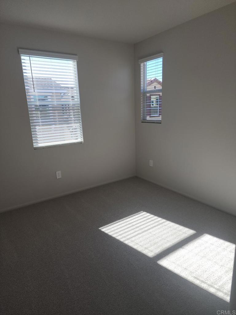 28386 Via Solero Temecula, CA 92591 - Photo 13 of 17 an empty room with windows