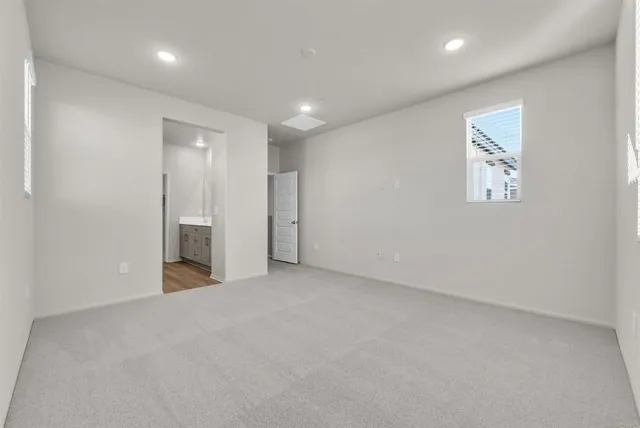 an empty room with entrance and door