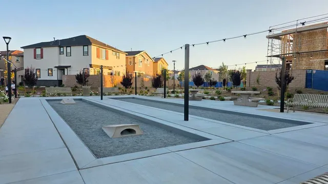 a outdoor space with lots of tables and chairs