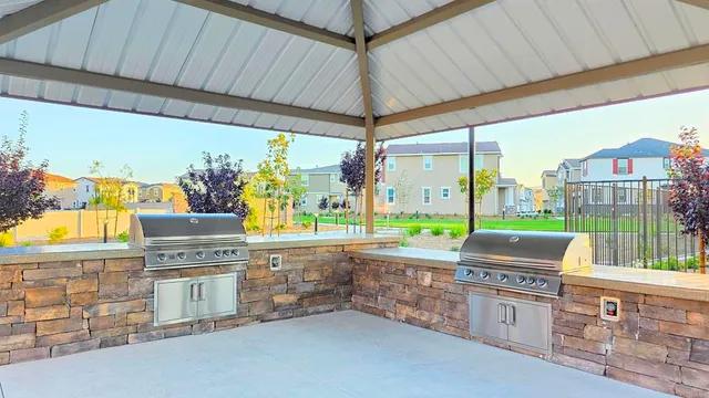 a balcony with furniture and outdoor view