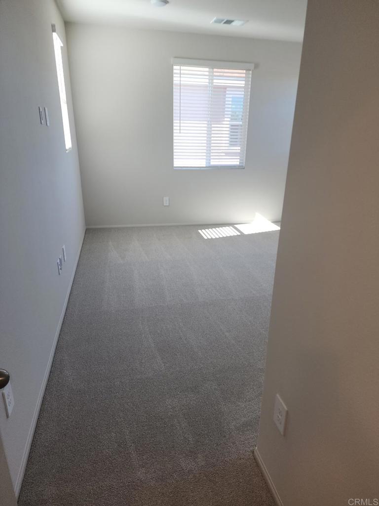 28386 Via Solero Temecula, CA 92591 - Photo 8 of 17 an empty room with a window