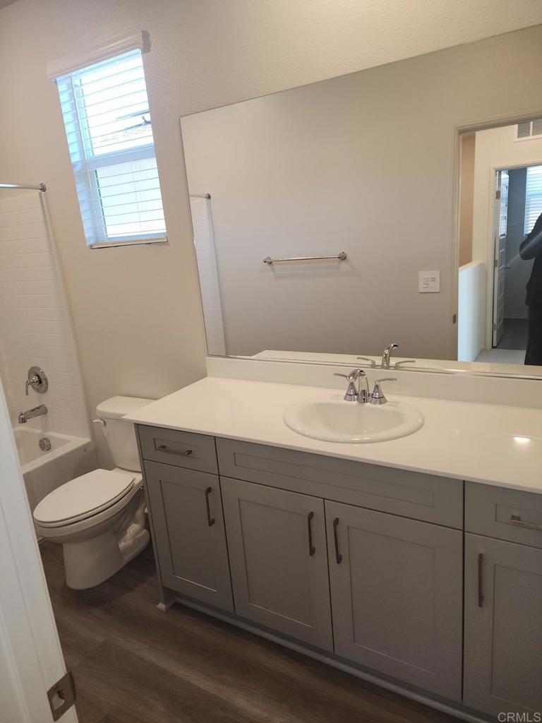 28386 Via Solero Temecula, CA 92591 - Photo 10 of 17 a bathroom with a sink toilet and vanity