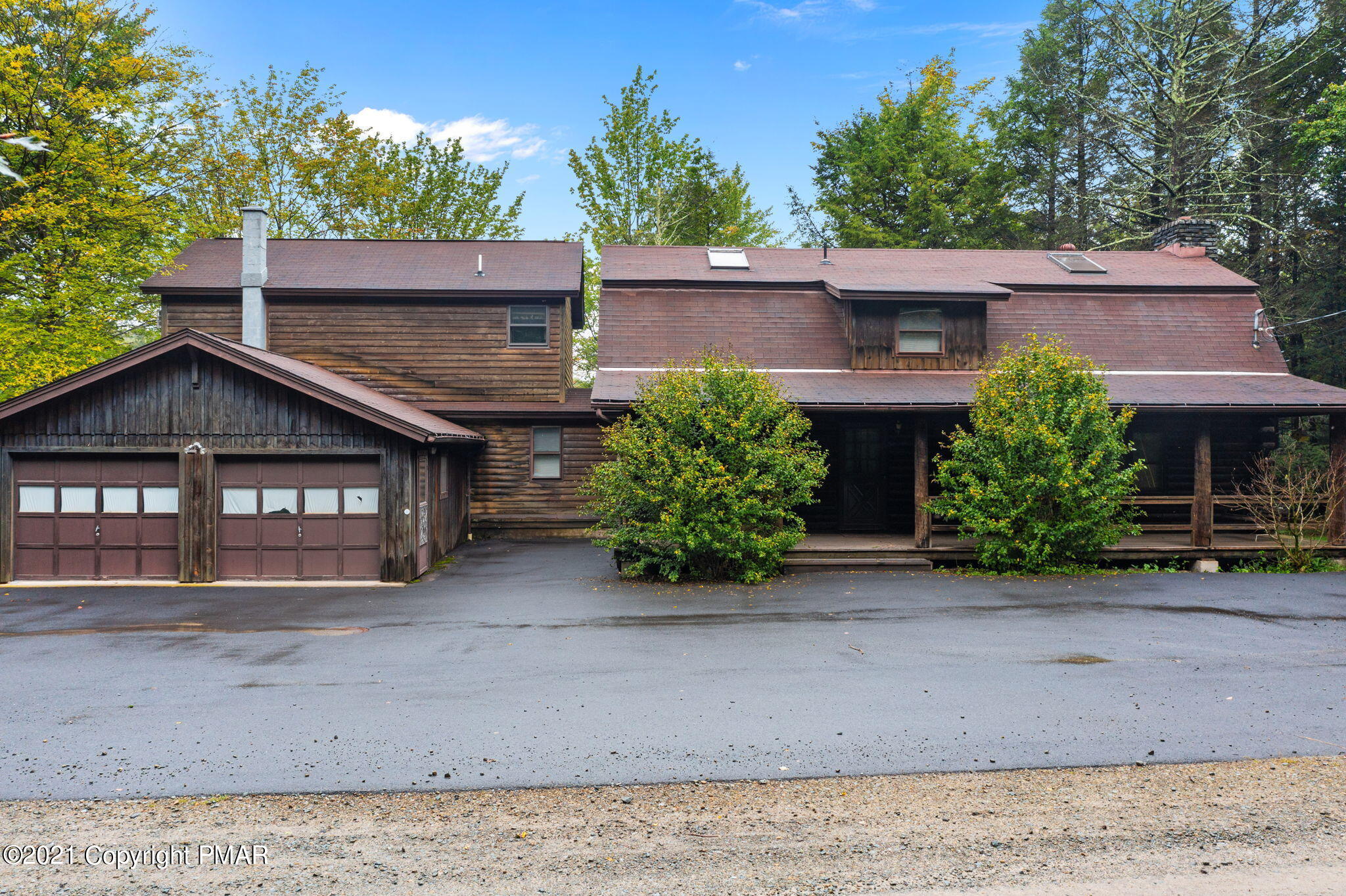 45 Long River Road Newfoundland, PA 18445 - Photo 2 of 46 front view of a house with a street