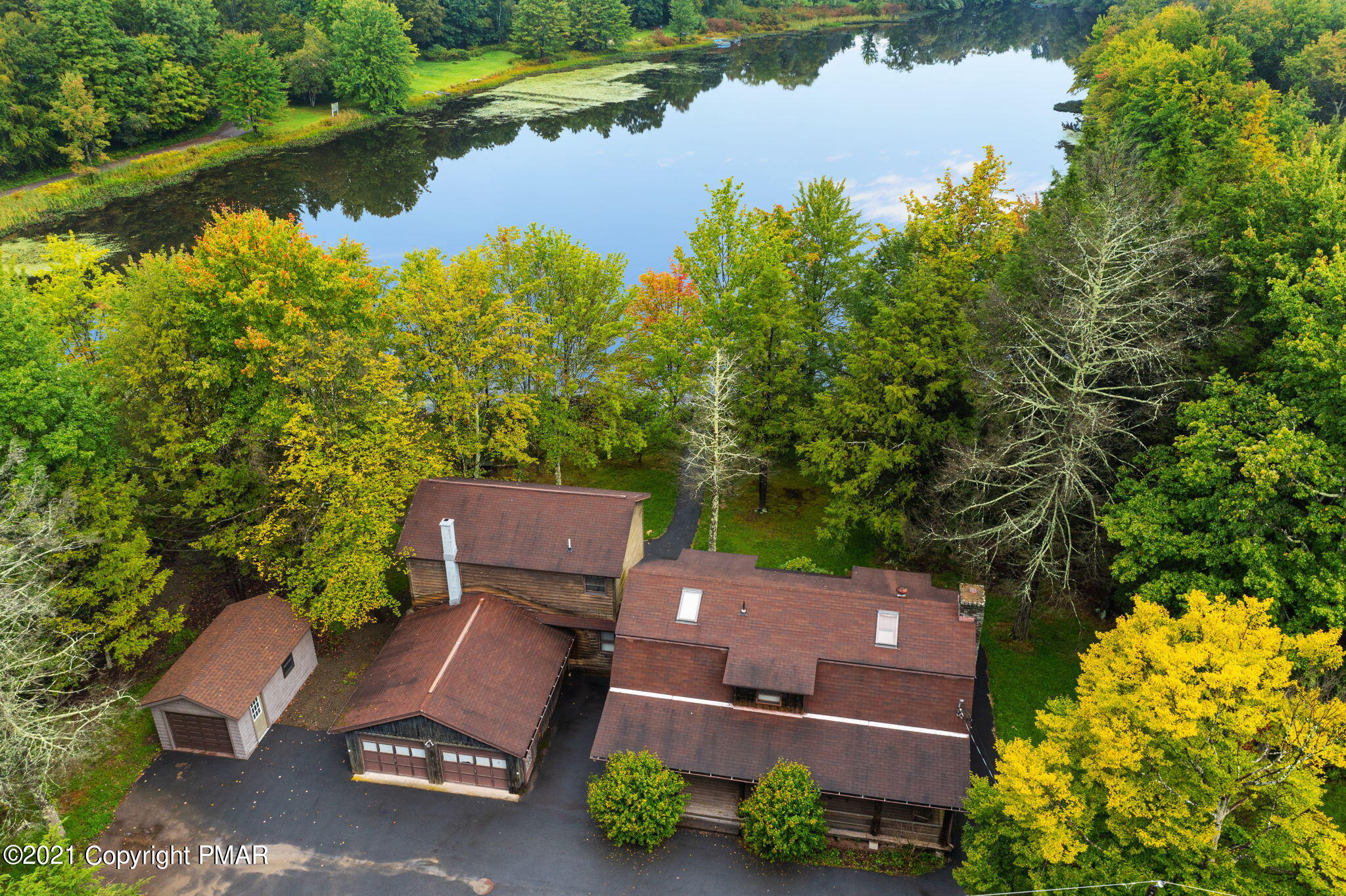 45 Long River Road Newfoundland, PA 18445 - Photo 6 of 46 an aerial view of a house with a lake view