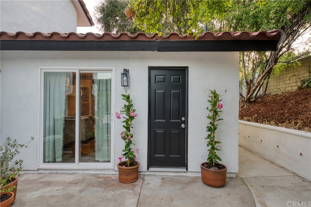 314 Shadow Lane Monrovia, CA 91016 - Photo 30 of 43 a potted plant sitting in front of a door