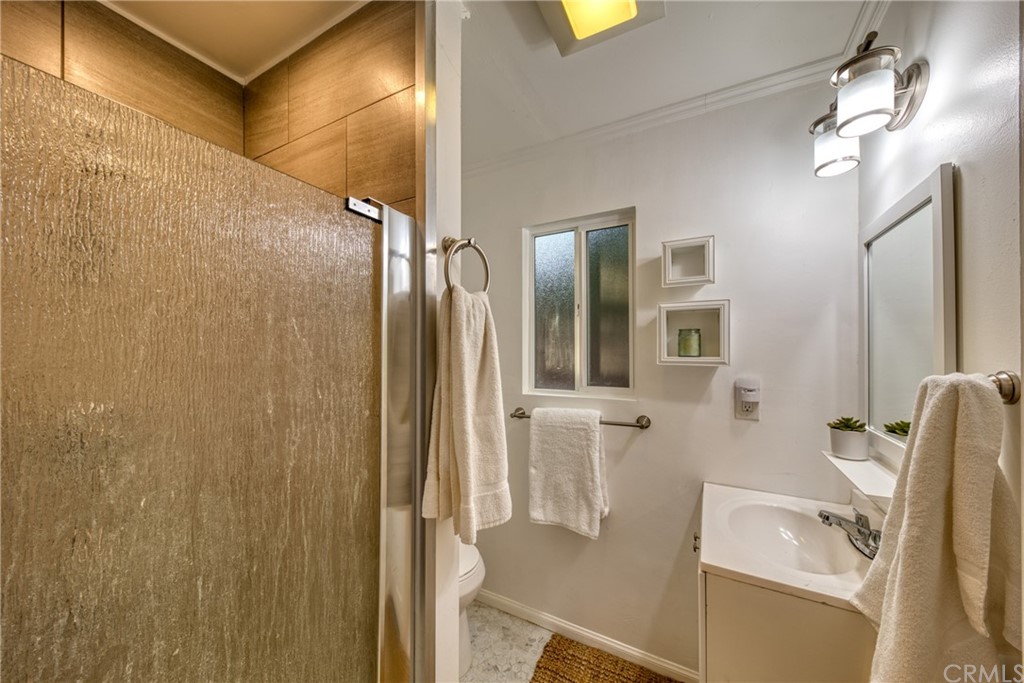 314 Shadow Lane Monrovia, CA 91016 - Photo 36 of 43 a bathroom with a sink and mirror