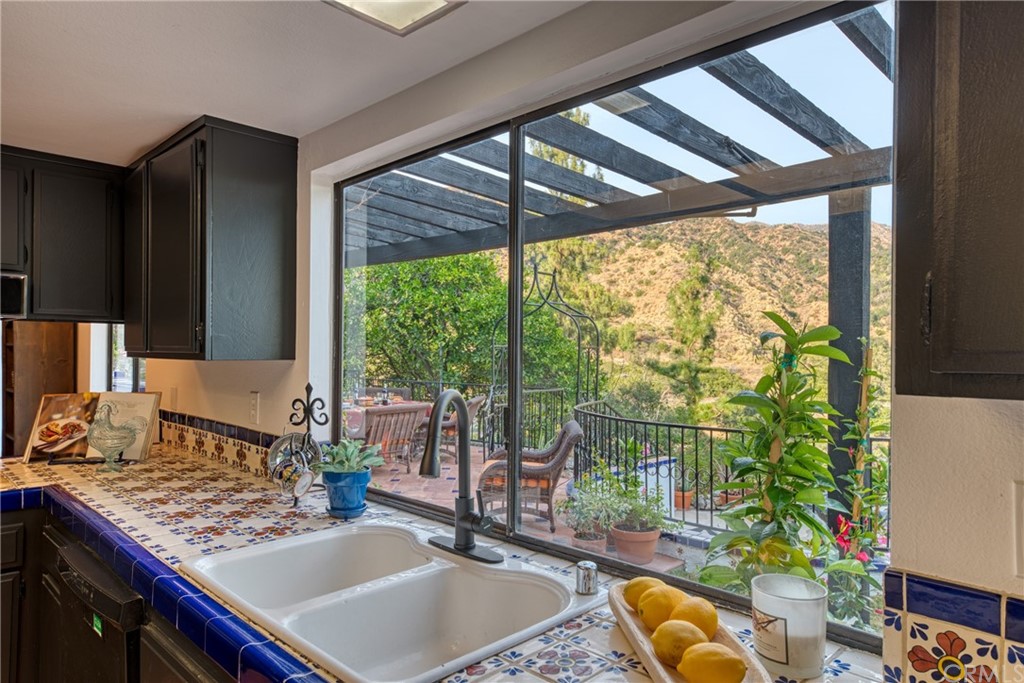 314 Shadow Lane Monrovia, CA 91016 - Photo 10 of 43 a room with furniture a window and a sink