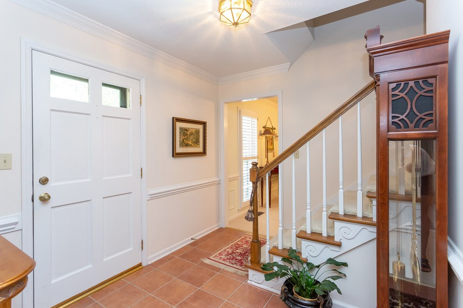 8609 Seagate Drive Raleigh, NC 27615 - Photo 4 of 28 Nice foyer entry with tile flooring. Perfect spot for the grandfather clock. Foyer