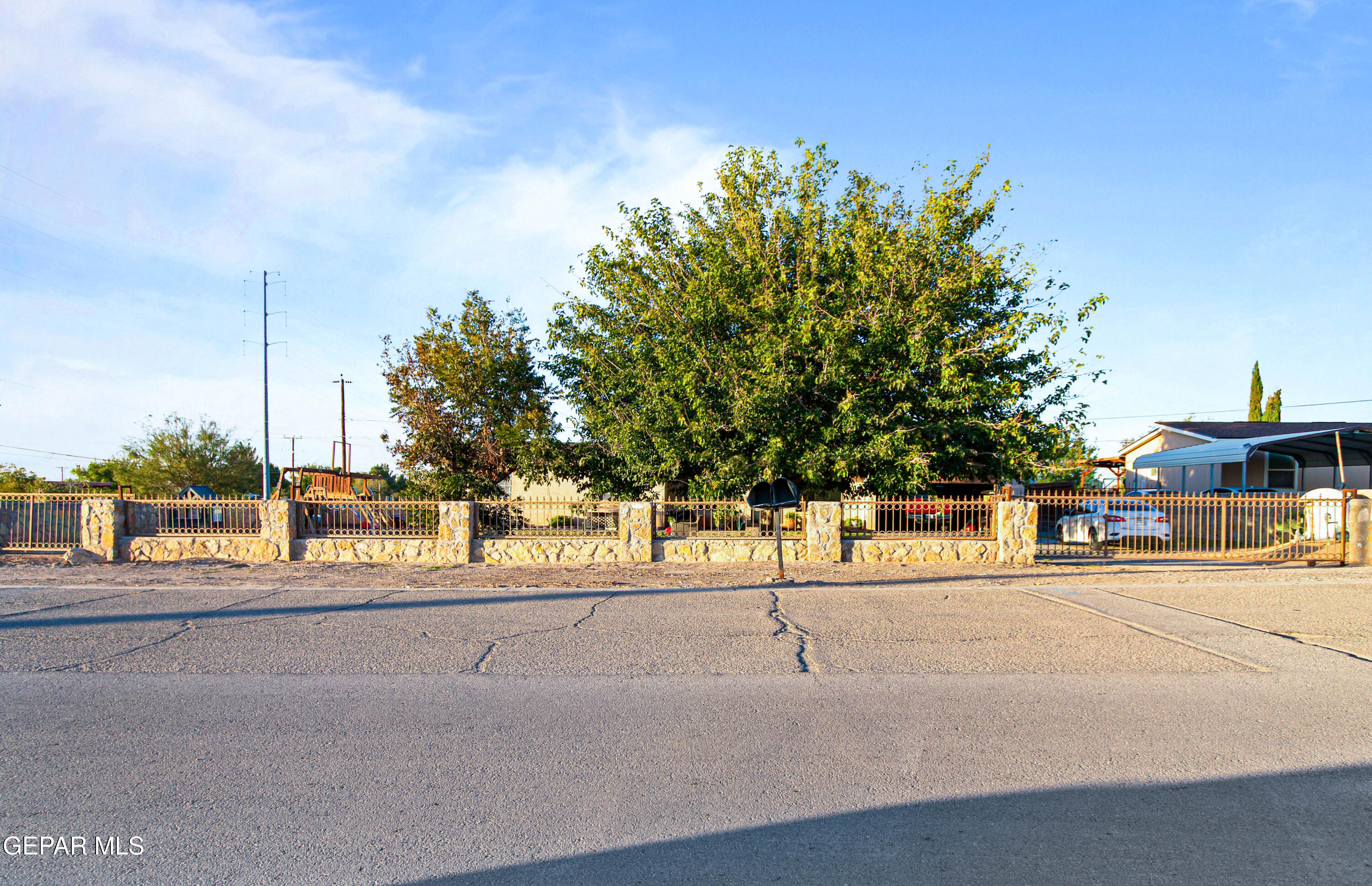 171 Holguin Avenue Vinton, TX 79821 - Photo 1 of 35 a view of a street with houses