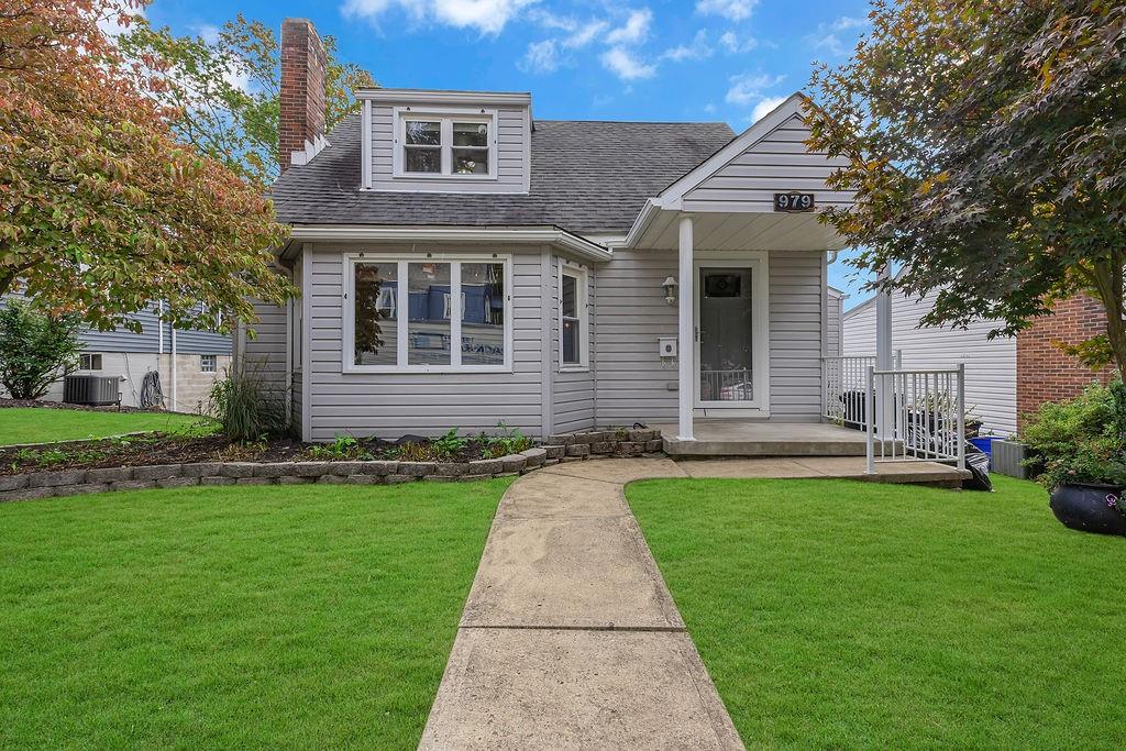 979 Seventh Street Beaver, PA 15009 - Photo 1 of 44 a front view of a house with a yard
