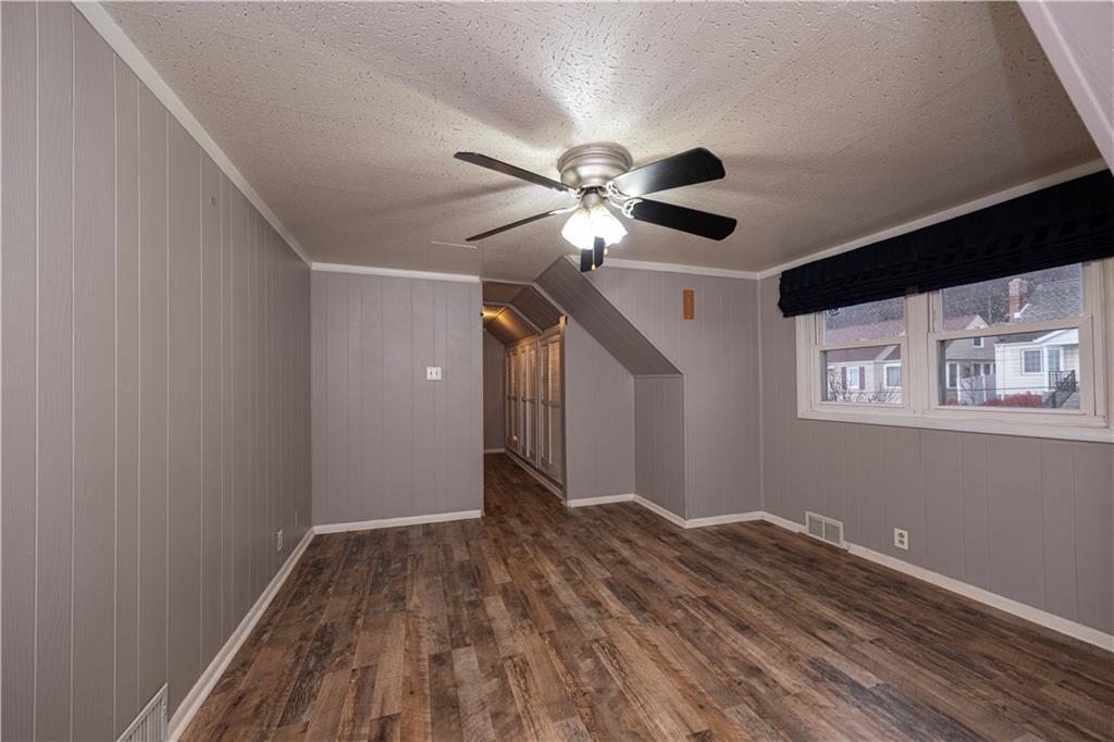 979 Seventh Street Beaver, PA 15009 - Photo 29 of 44 a view of empty room with wooden floor