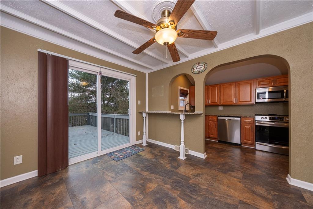 979 Seventh Street Beaver, PA 15009 - Photo 31 of 44 a view of a livingroom with a fireplace and wooden floor