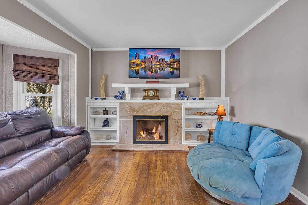979 Seventh Street Beaver, PA 15009 - Photo 7 of 44 a living room with furniture and a fireplace
