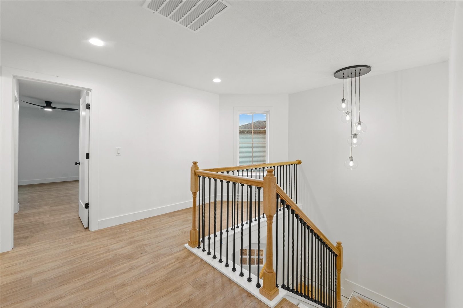 3708 Lighthouse Pointe Champaign, IL 61822 - Photo 16 of 35 a view of a hallway with entryway and stairs