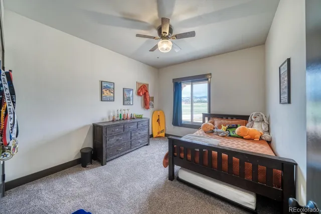 a bedroom with furniture and a bed