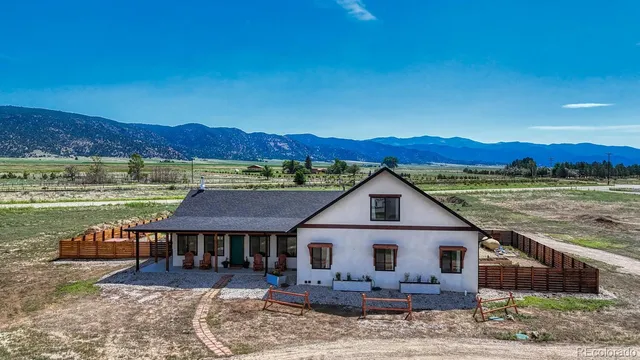 a view of a house with a ocean view