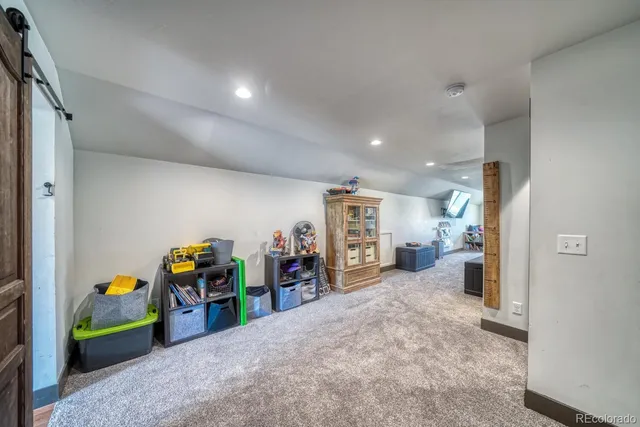 a view of a hallway view with staircase