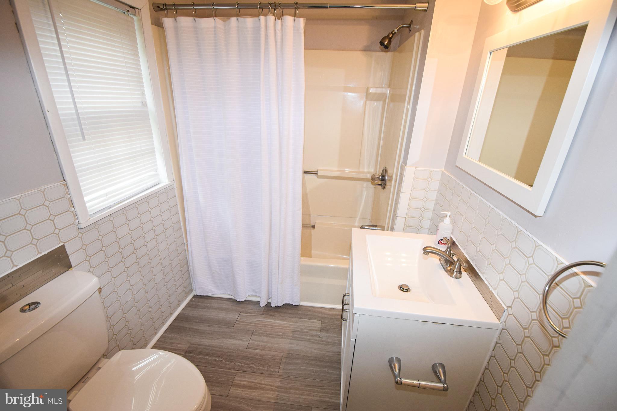 4411 Raspe Avenue Baltimore, MD 21206 - Photo 16 of 31 Bathroom