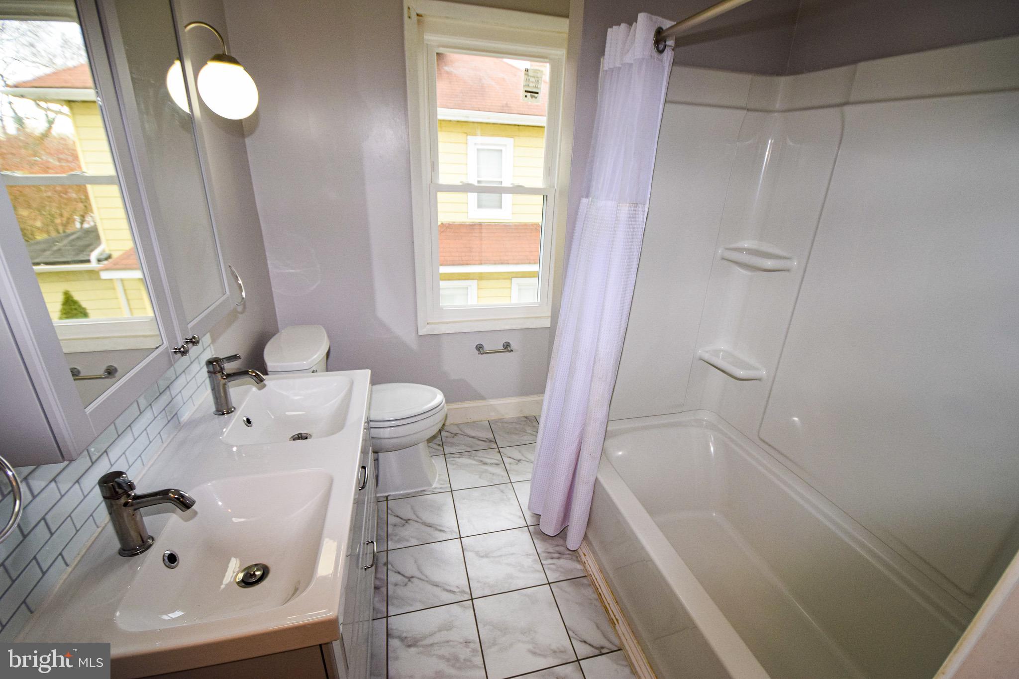 4411 Raspe Avenue Baltimore, MD 21206 - Photo 24 of 31 Upstairs bathroom