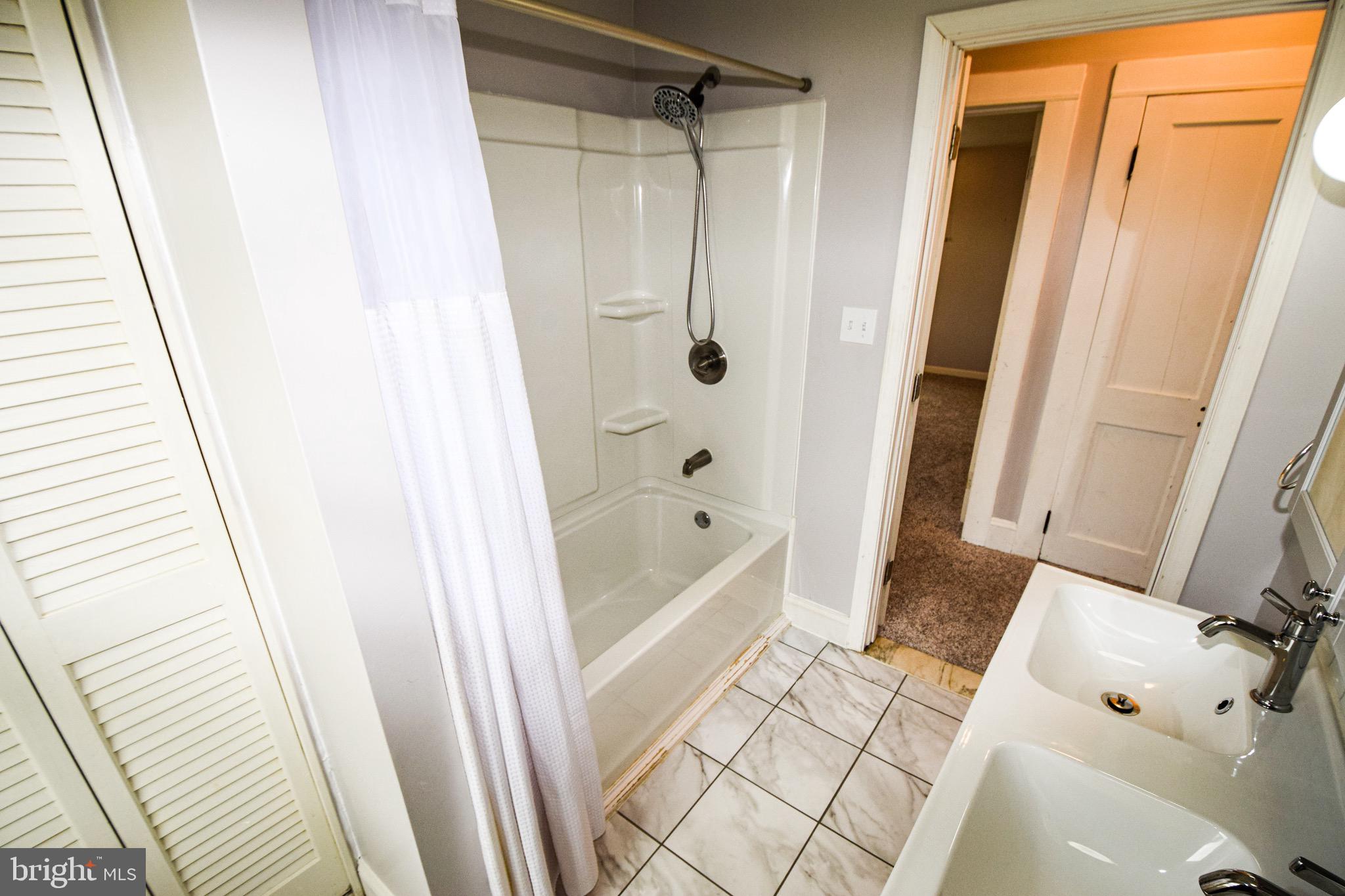 4411 Raspe Avenue Baltimore, MD 21206 - Photo 25 of 31 Upstairs bathroom