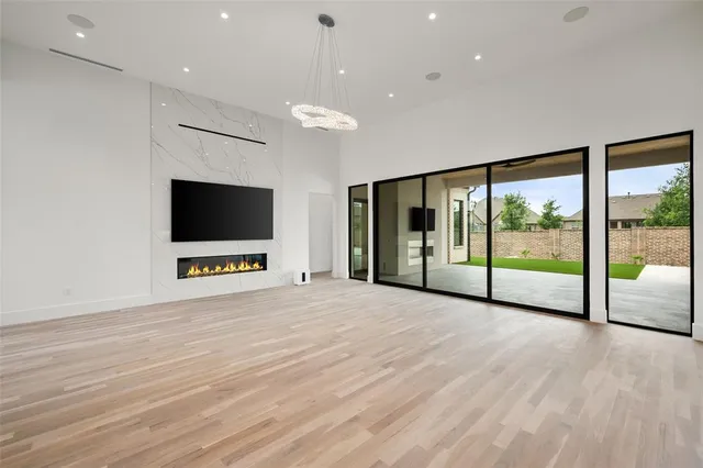 a view of an empty room with a sliding door