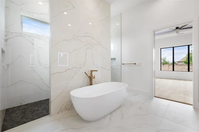 a bathroom with a double vanity sink and mirror
