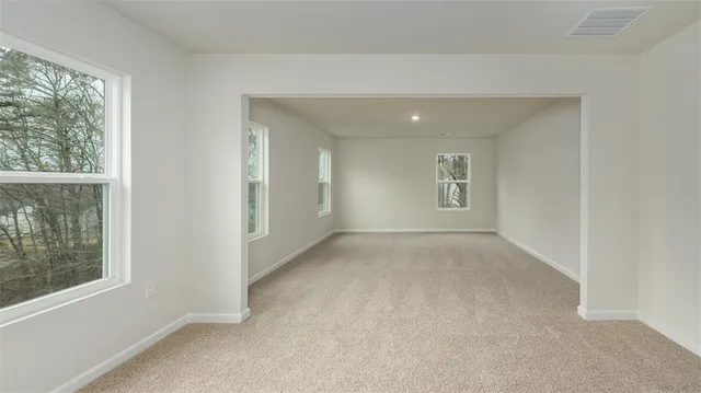 an empty room that has a window