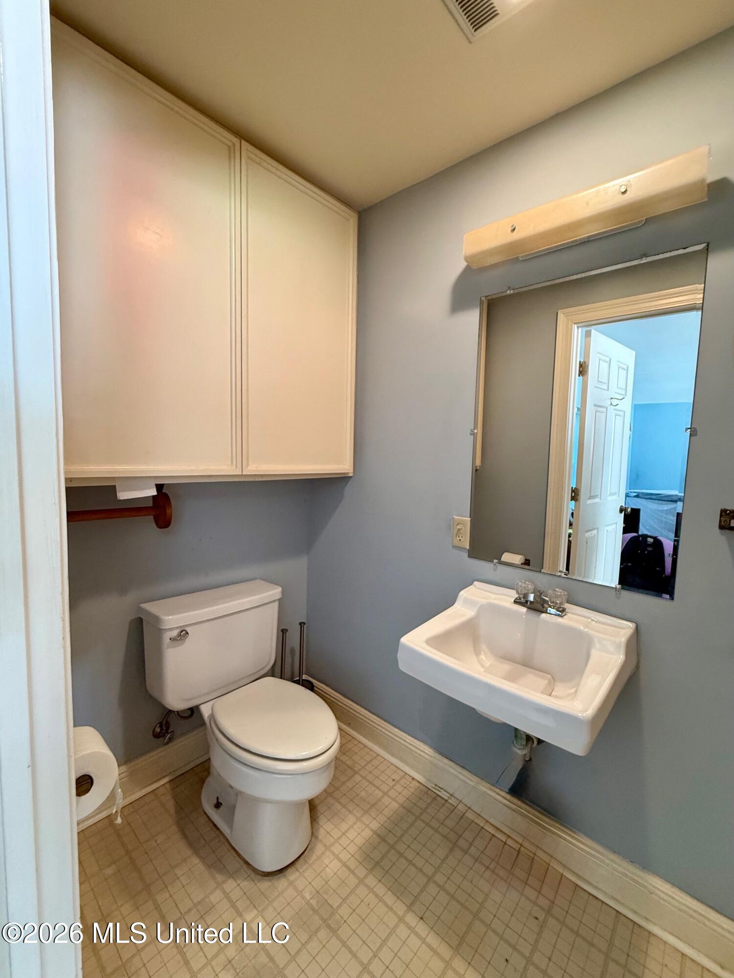 7740 Moanalua Way Diamondhead, MS 39525 - Photo 53 of 55 Garage Bathroom