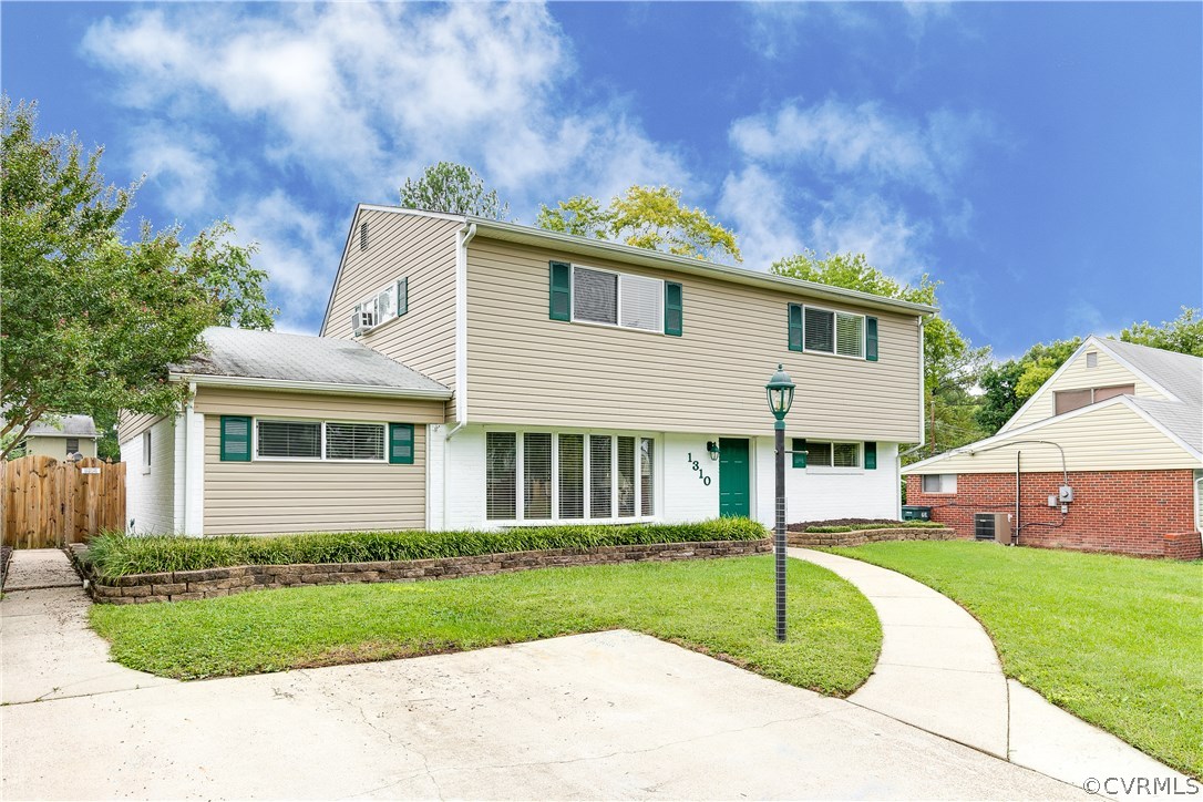 1310 Westridge Road Henrico, VA 23229 - Photo 1 of 42 Two-story with painted white brick and gray vinyl