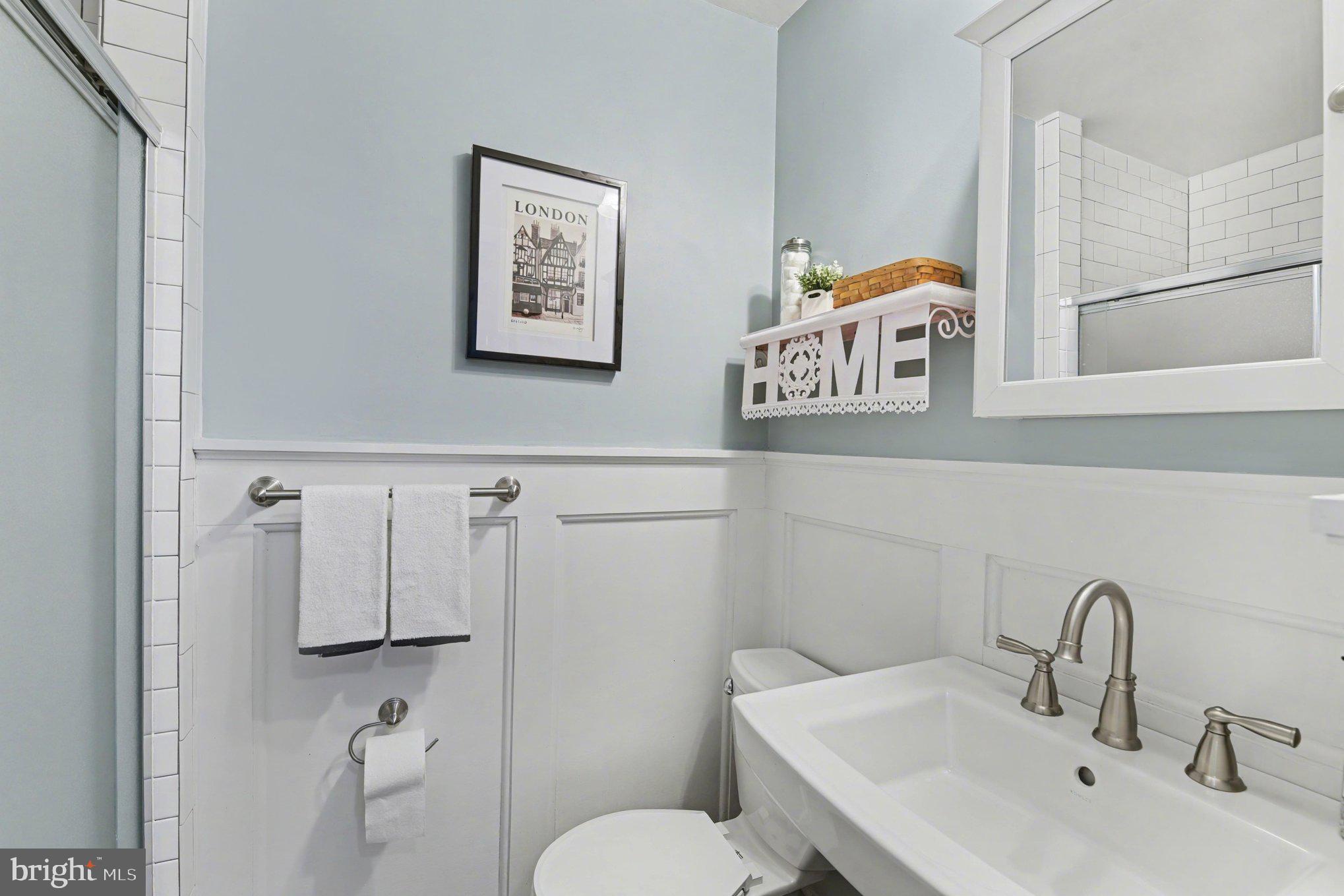 1411 Valley Stream Road Bel Air, MD 21014 - Photo 20 of 49 a bathroom with a sink and mirror with toilet