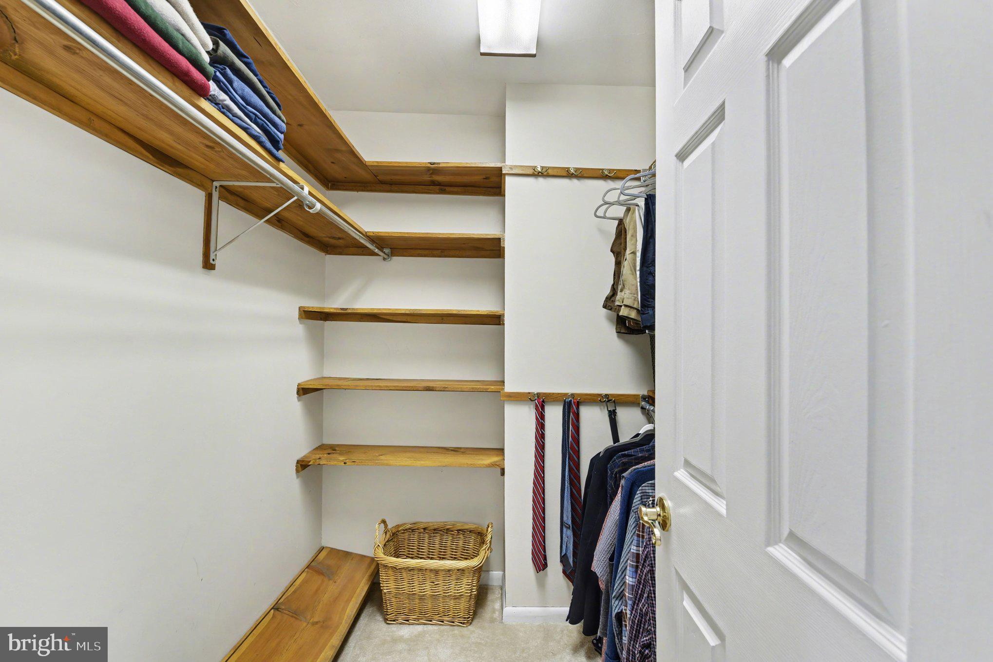 1411 Valley Stream Road Bel Air, MD 21014 - Photo 26 of 49 a view of walk in closet with clothes and shoes