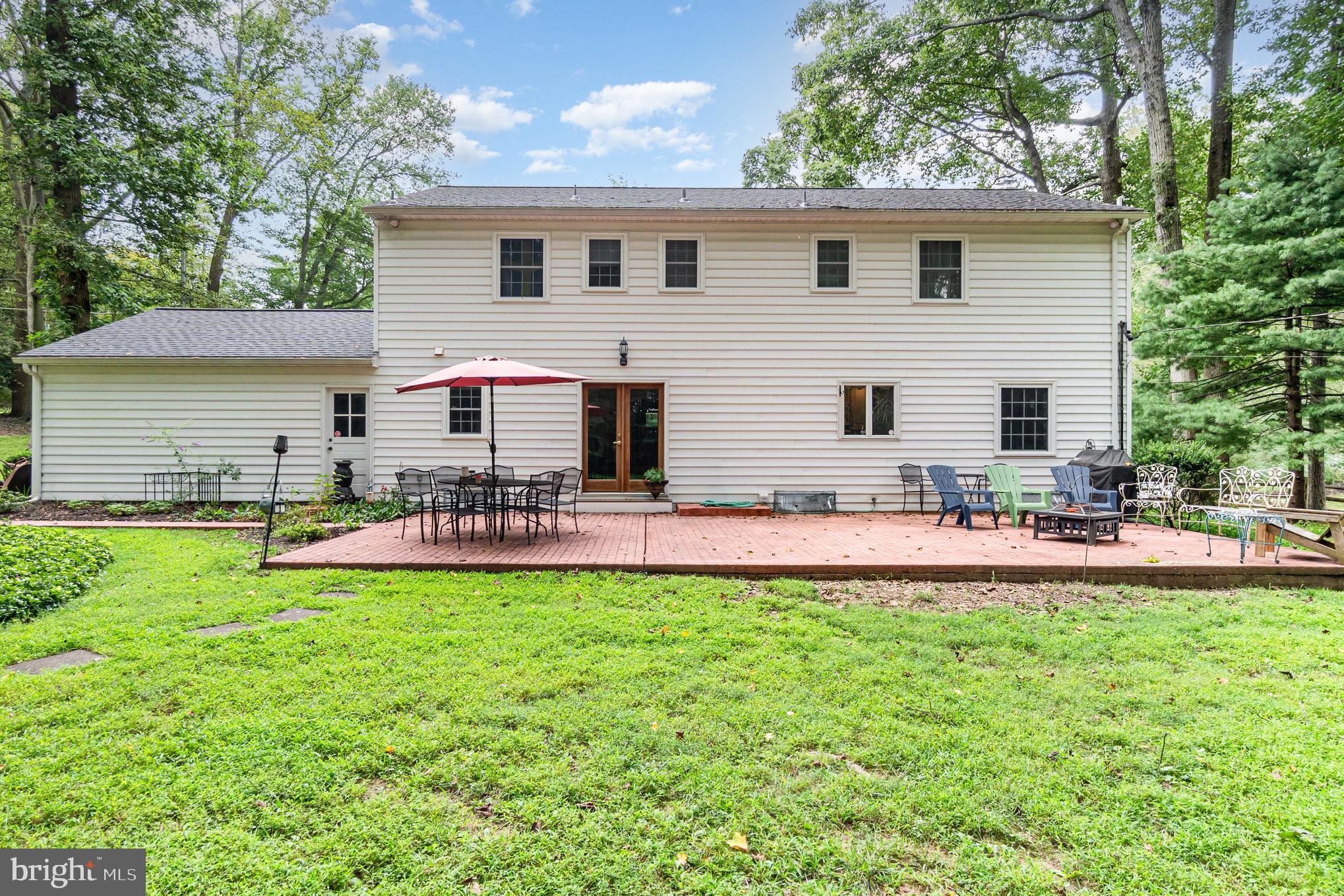 1411 Valley Stream Road Bel Air, MD 21014 - Photo 40 of 49 a front view of house with yard and outdoor seating