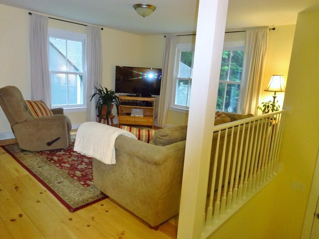 687 Stream Road Winterport, ME 04496 - Photo 7 of 35 The living room is spacious and bright
