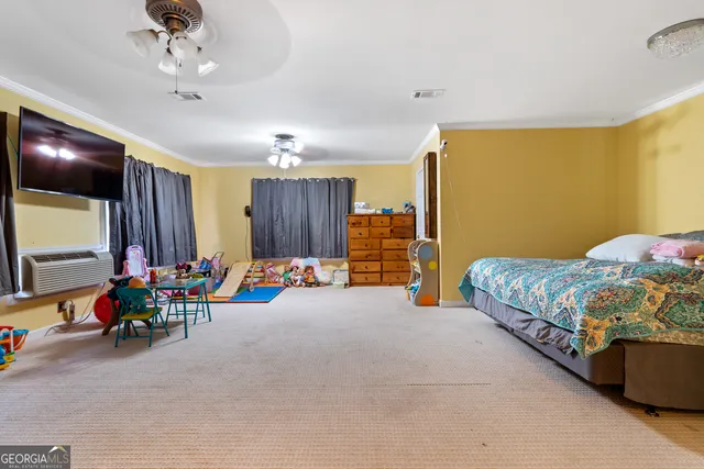 a bathroom with a double vanity sink a toilet and a mirror