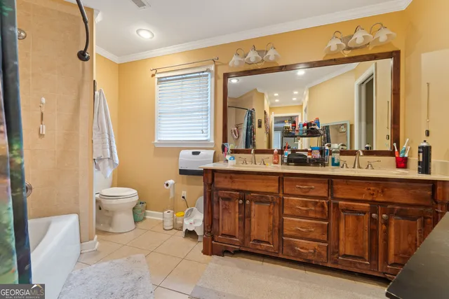 a view of a swimming pool with lounge chair in the patio