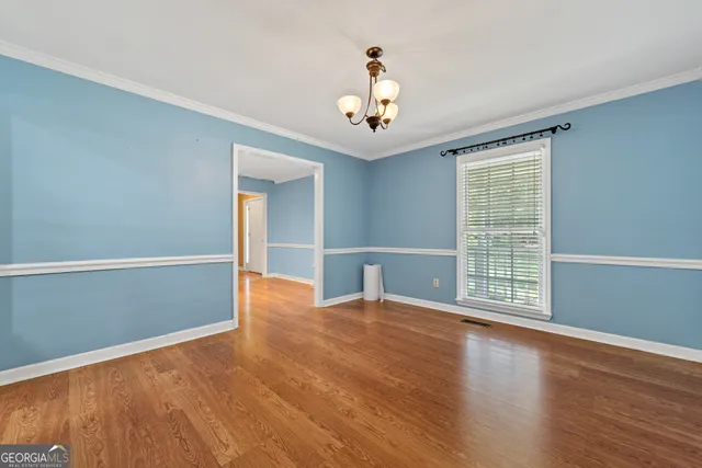 a kitchen with stainless steel appliances granite countertop a stove sink microwave and cabinets