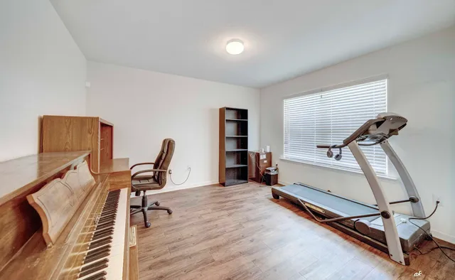 a view of a room with gym equipment